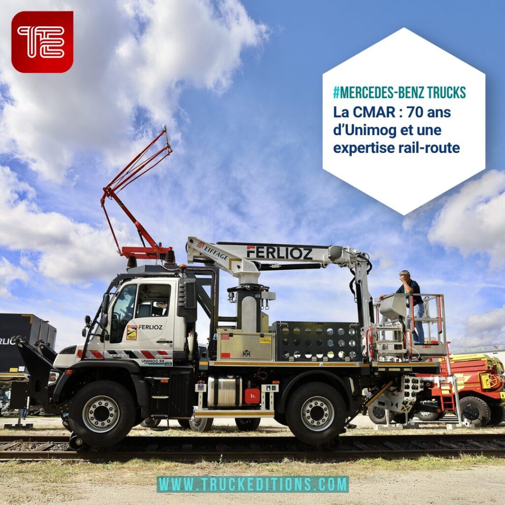 Unimog rail-route équipé d’une nacelle, présenté sur une voie ferrée lors de l’événement CMAR.
